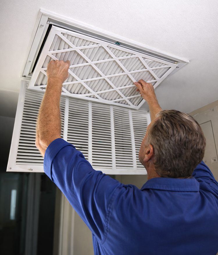 Cleaning ductwork using spinning brushes